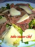 Veal Strips with Parmesan Shavings on a Bed of Salad