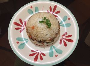 Una foto de Arroz tapado