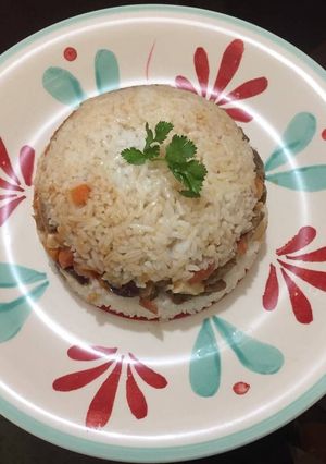Una foto de Arroz tapado