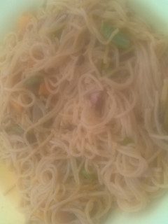 A picture of Jollof spaghetti and vegetable.
