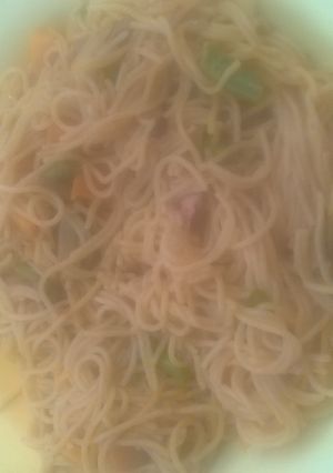 A picture of Jollof spaghetti and vegetable.