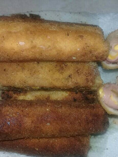 Una foto de Enrollados de jamón y queso