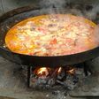 Pollo al disco, a leña