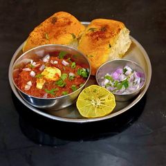 A picture of Butter Loaded Pav Bhaji.