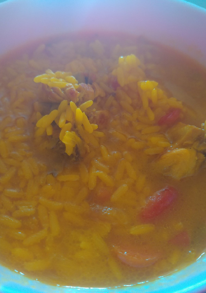 Una foto de Arroz caldoso con pollo