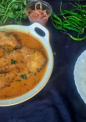 A picture of Rohu fish curry.