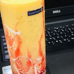 A picture of Mango sunset mocktail.