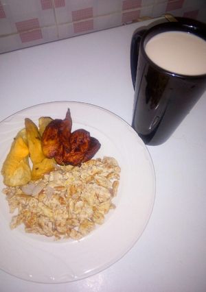 A picture of Sweet potatoes, plantain and scramble eggs.