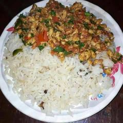 A picture of Scrambled eggs and rice.