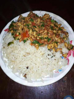 A picture of Scrambled eggs and rice.