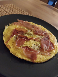 Una foto de 🍕 Tortipizza de jamón y tomate