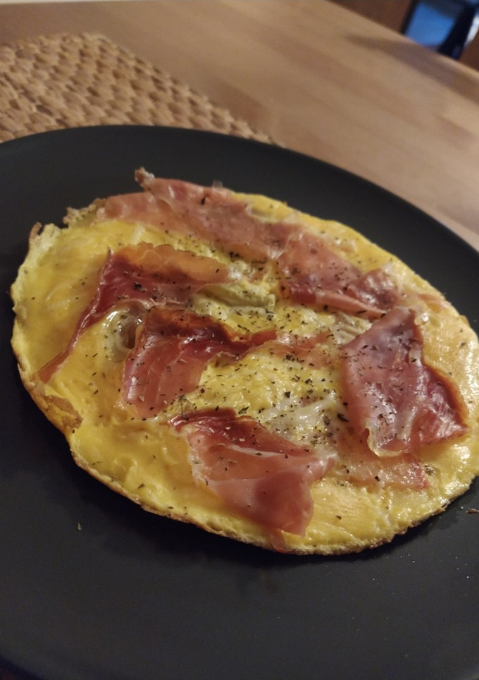 Una foto de 🍕 Tortipizza de jamón y tomate