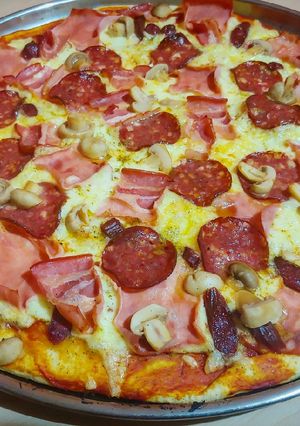Una foto de Pizza a mi estilo