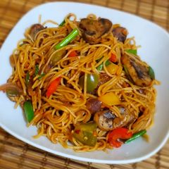 A picture of Sweet n sour veg noodles.