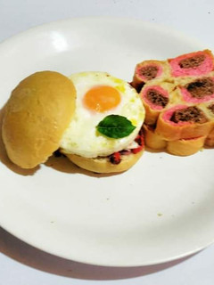 A picture of Paw Bread and Steamed fried Sunny Side Up.