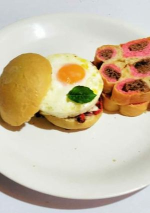 A picture of Paw Bread and Steamed fried Sunny Side Up.