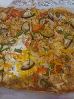 Una foto de Topping pizza verduras
