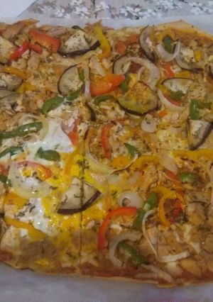 Una foto de Topping pizza verduras