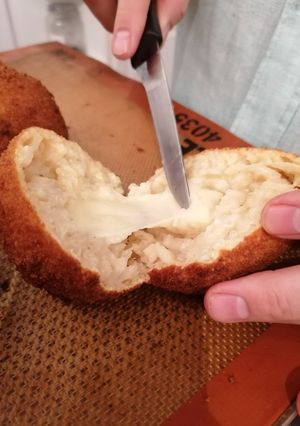 Une photo de Arancini Di Mozzarella