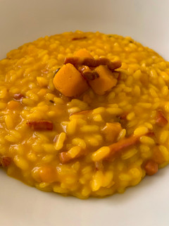 Foto di Risotto con zucca e speck