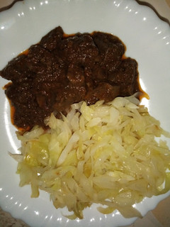 A picture of WET FRIED LIVER* SAUTÉED *CABBAGE*UGALI.