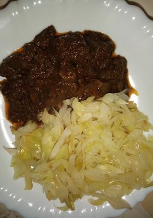 A picture of WET FRIED LIVER* SAUTÉED *CABBAGE*UGALI.