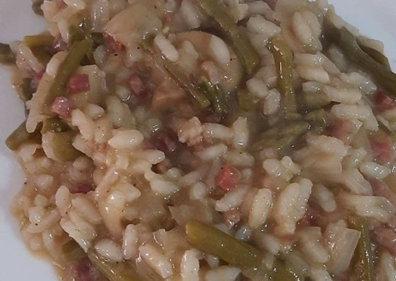 Risotto con trigueros, jamón y carne picada