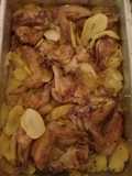 Alitas de pollo con papas al horno