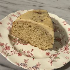 A picture of Banana Cake w/ Cookie Butter Icing.