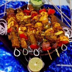 A picture of Grilled veggies with paneer.