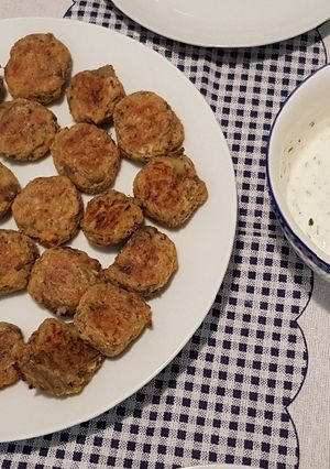 A picture of Aubergine balls aka Melitzanokeftedes in the oven.