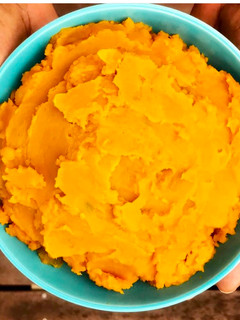 A picture of African Pumpkin mash with peanut butter.