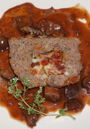 A picture of Meatloaf with Mozzarella Cheese and Sun-Dried Tomatoes, Jon Style.