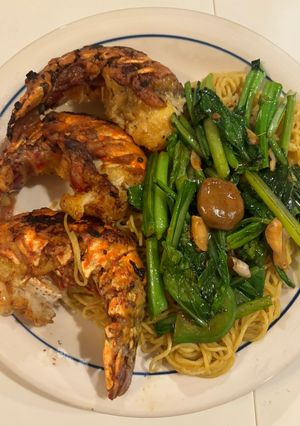 A picture of Stir-Fried Noodles with Lobster and Mushrooms.
