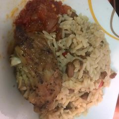 A picture of Rice and Beans with Chicken Stew.