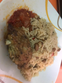 A picture of Rice and Beans with Chicken Stew.