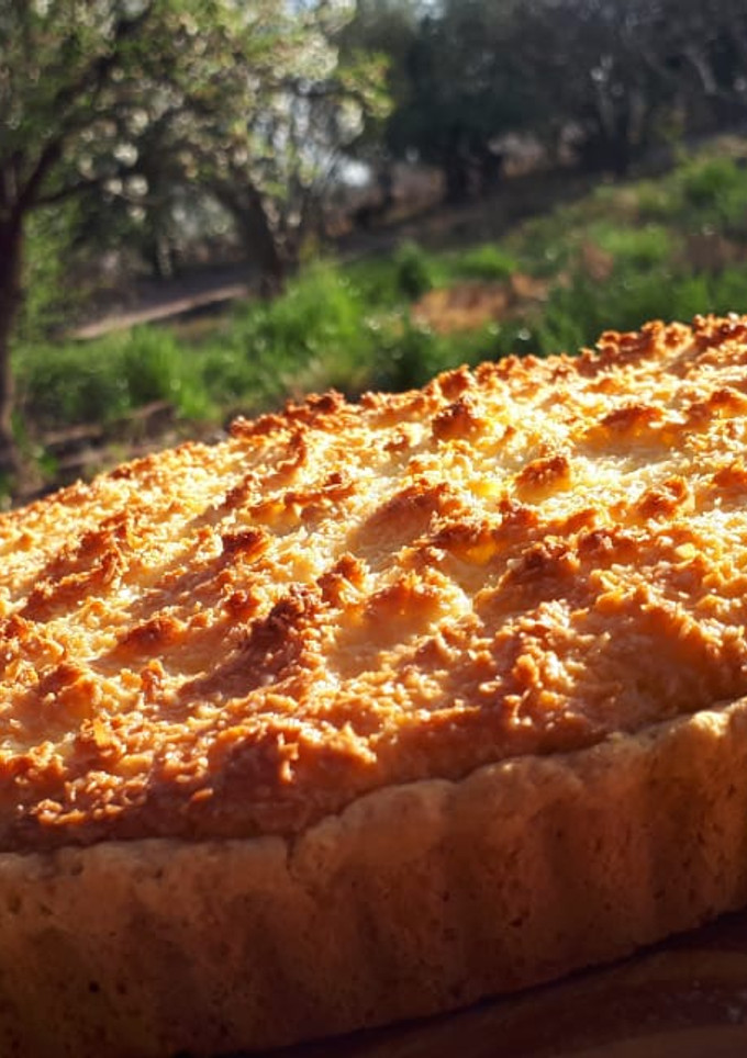 Una foto de Tarta de coco y dulce de leche