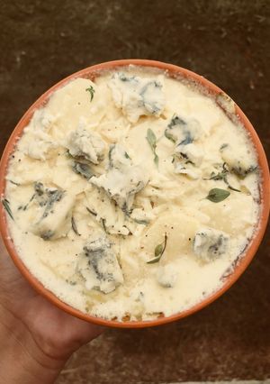Una foto de Gratinado de papas con hierbas