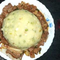 A picture of Mukimo/ beef stew.