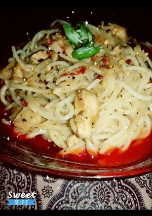 A picture of Smoky chicken spaghetti 🍝🍷.