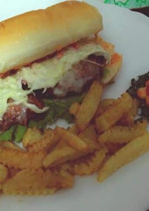 A picture of Cheesy zinger burger.