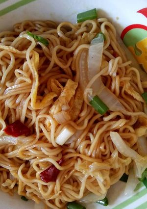 A picture of Lagman,noodle and vegetables.