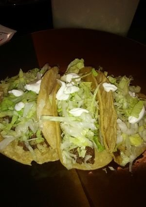 Una foto de Tacos de carne con papa