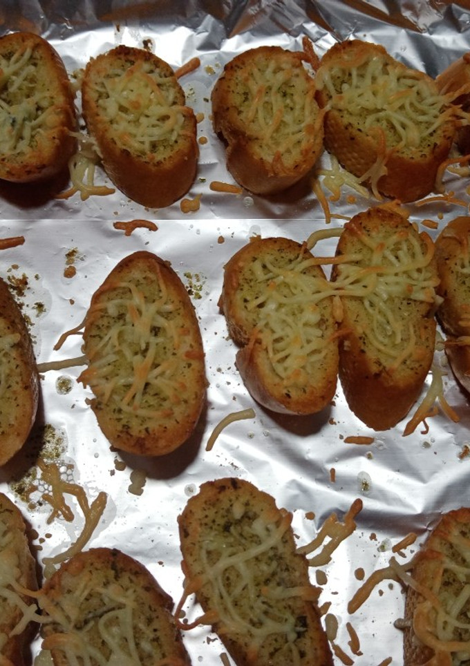 Una foto de Pan de ajo con queso