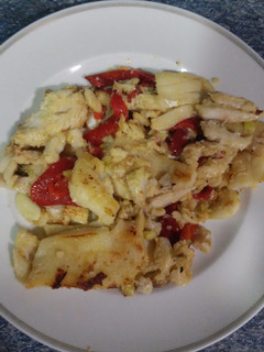 Una foto de Bacalao con pimientos