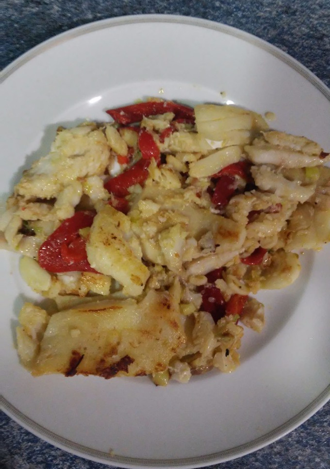Una foto de Bacalao con pimientos