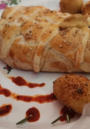 Una foto de Rollo de chile poblano hojaldrado