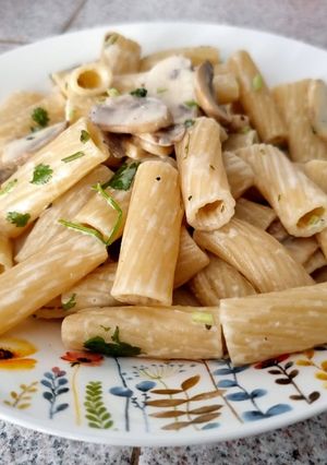 Una foto de Pasta con crema y champiñones