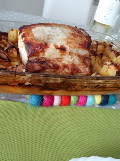 Una foto de Lomo de cerdo al horno con toques de manzana y cebolla
