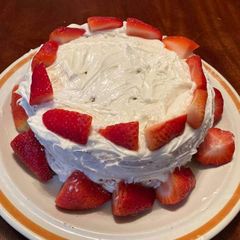 A picture of Johnny Cash inspired Strawberry Cake.
